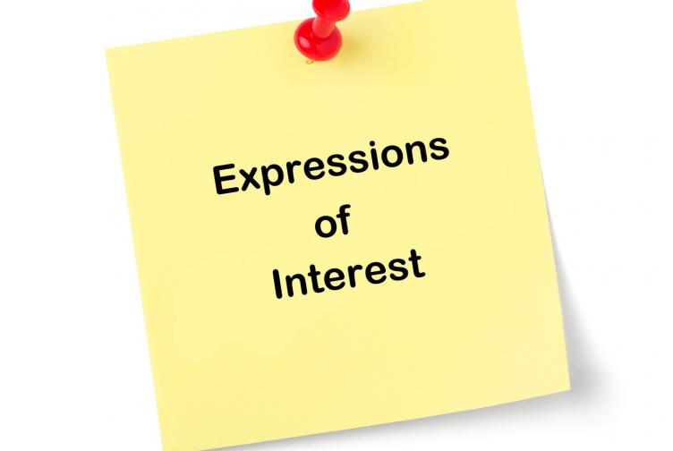 image of yellow post it note with the text 'Expressions of Interest'