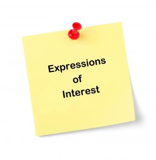 image of yellow post it note with the text 'Expressions of Interest'
